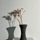 Dark green handcrafted vase with glazed ceramic grass blades