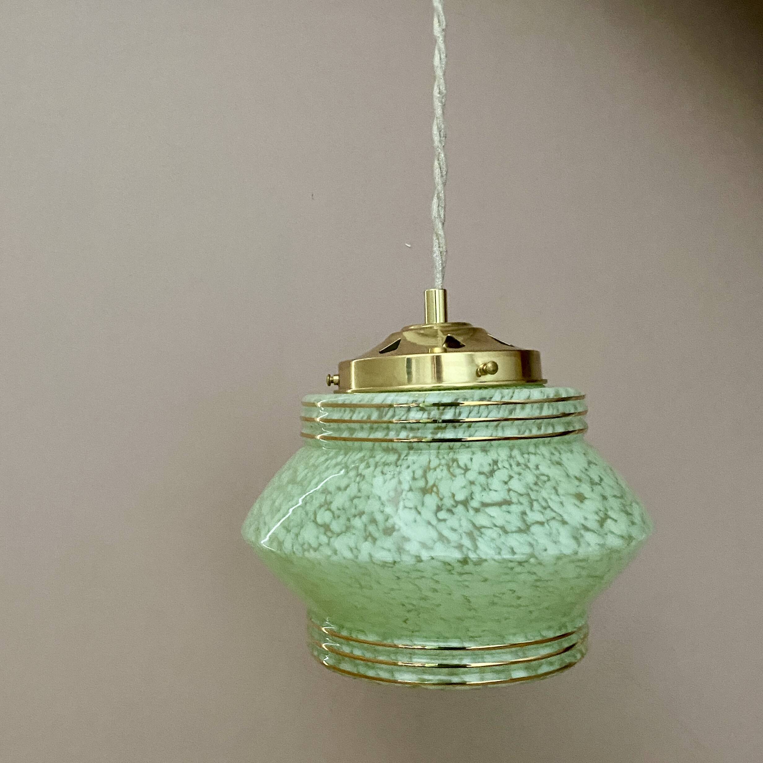 Art Deco globe pendant light in mint green and gold Clichy glass
