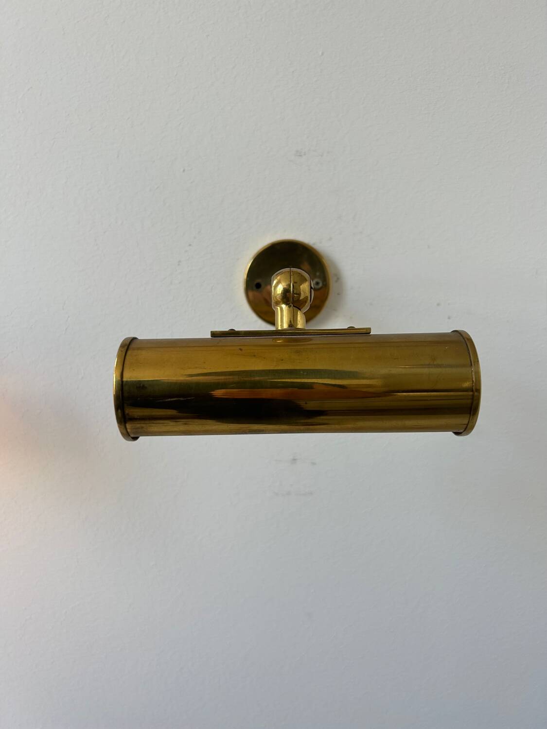 Pair of vintage adjustable wall lights, solid brass, France 1950