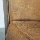 Charming 2-seater designer sofa made of sheep leather with a rustic look