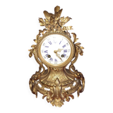 Clock, cartel in gilded bronze. Louis XV