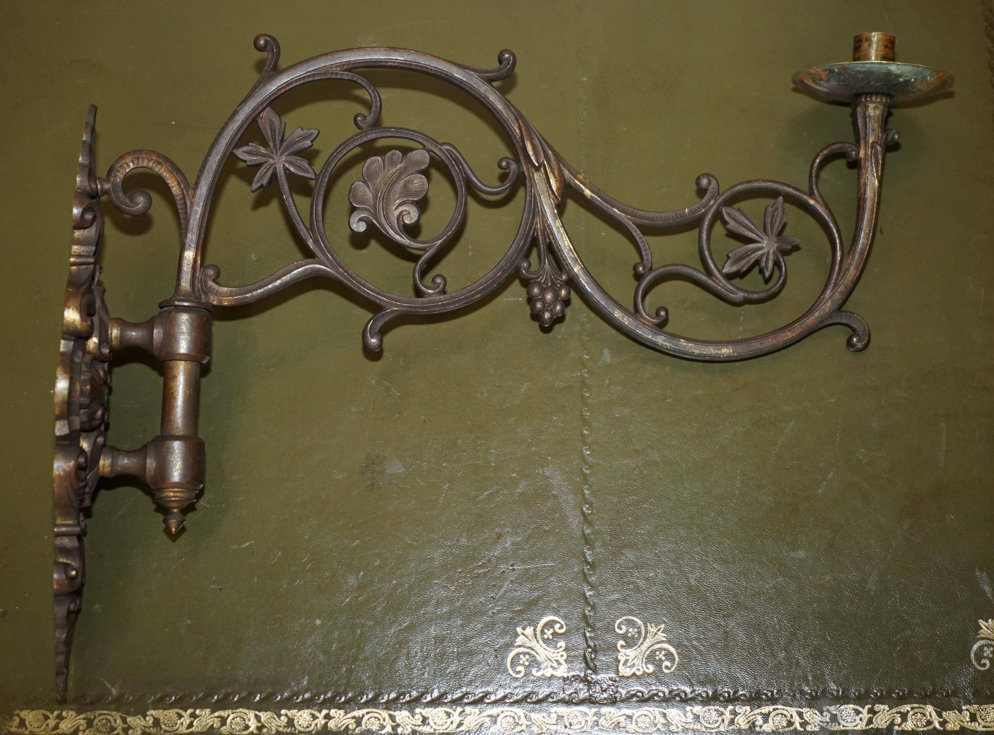 Pair of antique wall sconces in gilded bronze.