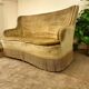Vintage mustard yellow two-seater sofa with fringe