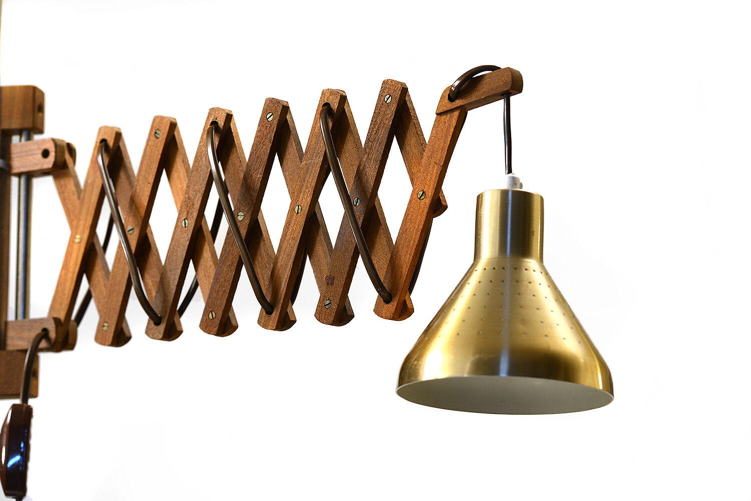 Solid teak wall lamp/Scissor lamp with brass coloured aluminium shade.