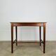 Minimalist Scandinavian teak desk from the 1960s, vintage.