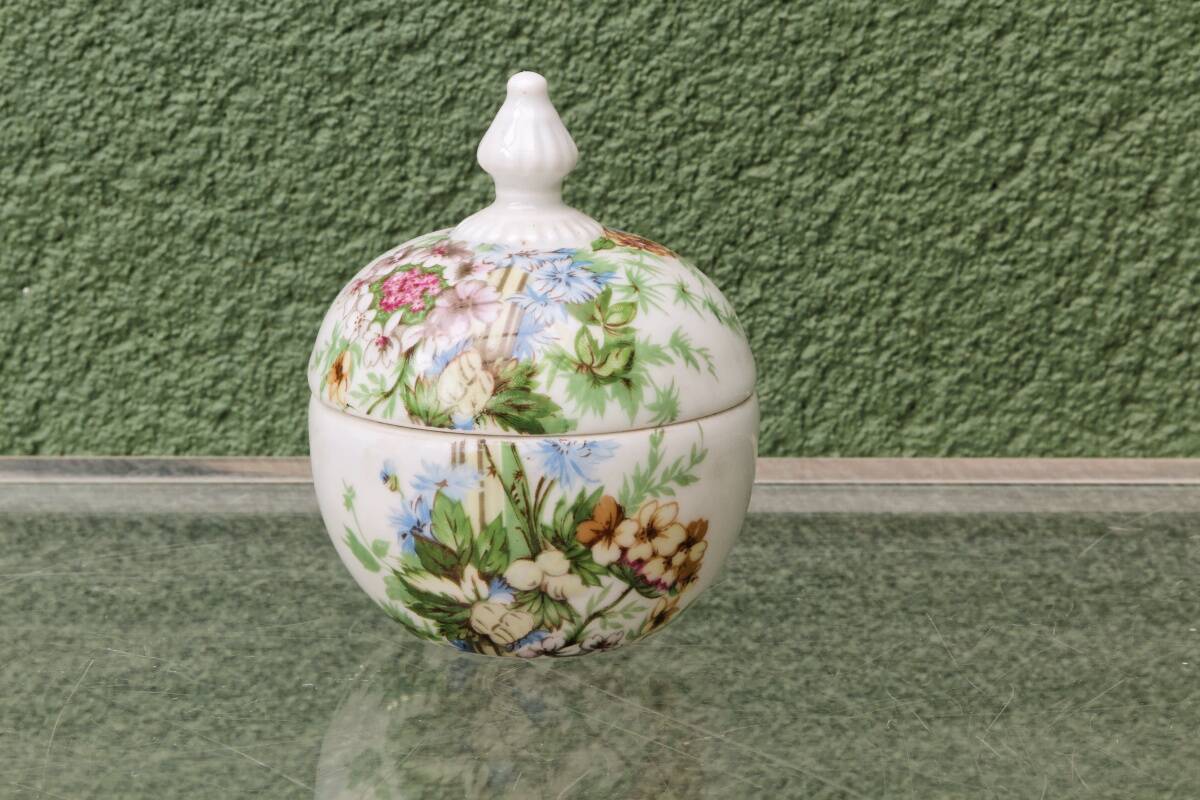 Set of 3 floral porcelain sweet jars from Paris.