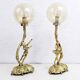 Pair of Commedia Dell Arte lamps in bronze and XXth glass