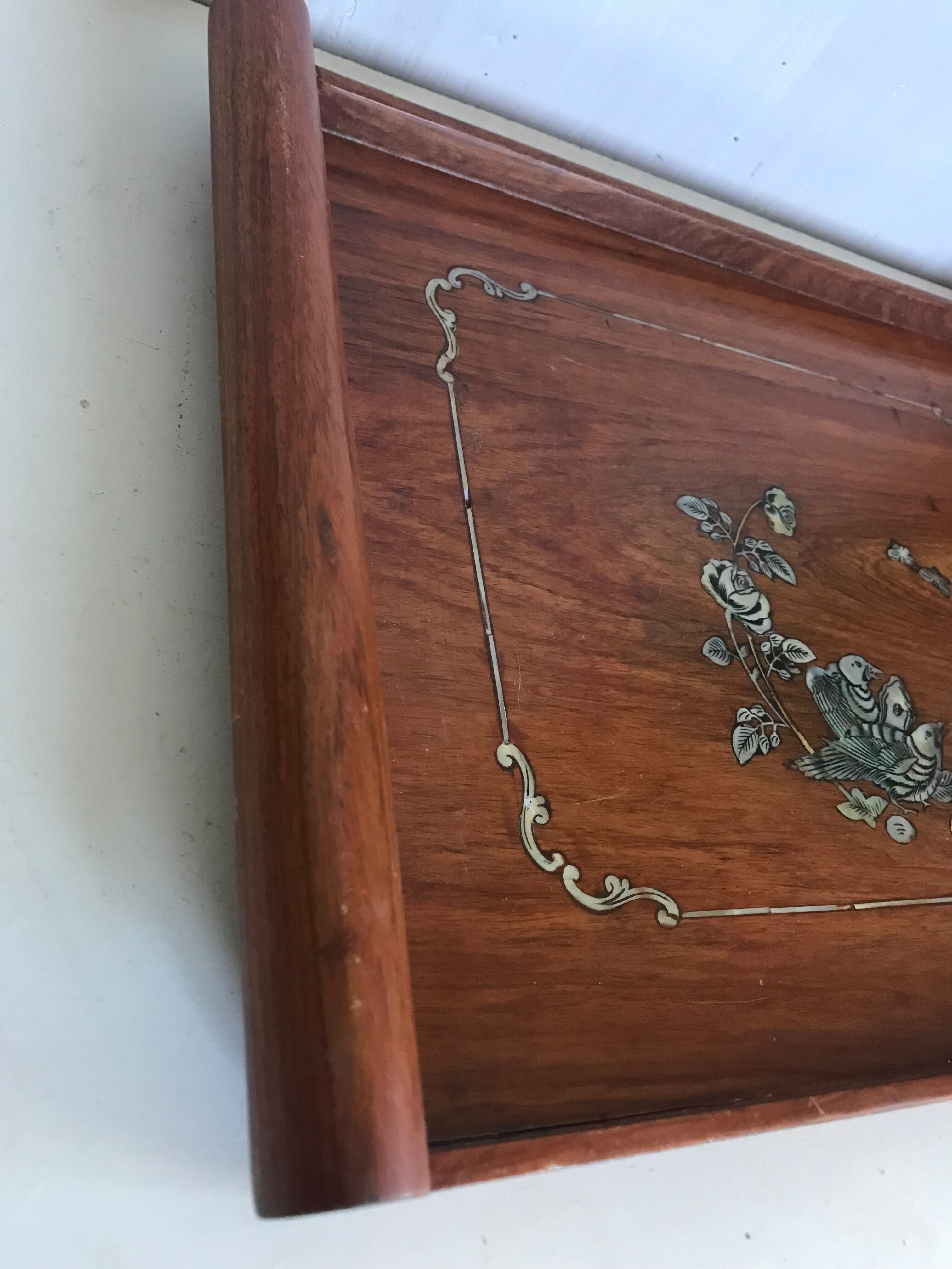 Wood and mother-of-pearl top