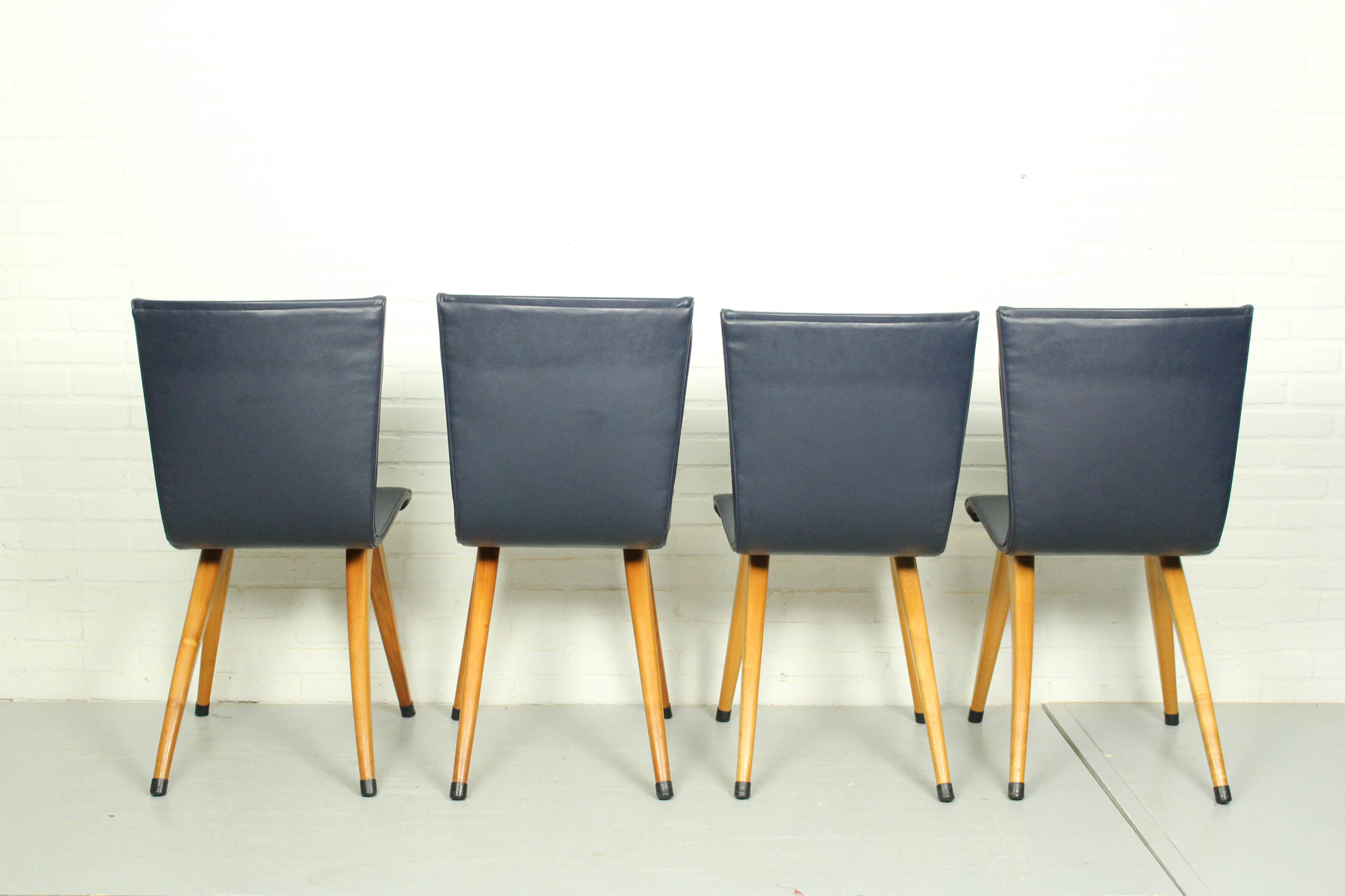 Set of 6 Cor van Os leatherette dining chair model Swing, 1960s