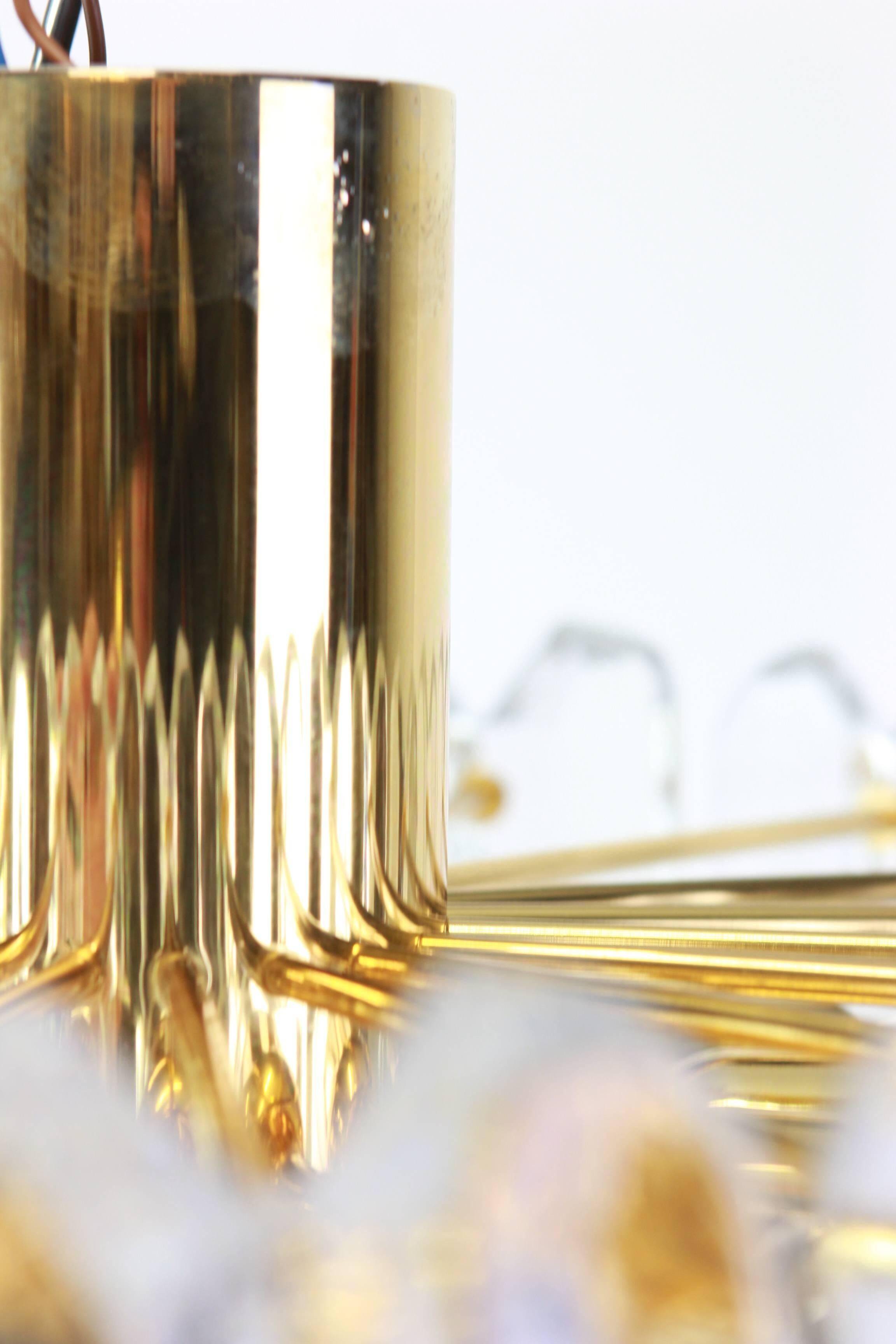 Magnificent luminaire in gilded brass and crystal glass Palazzo, Kalmar, Austria, 1970.