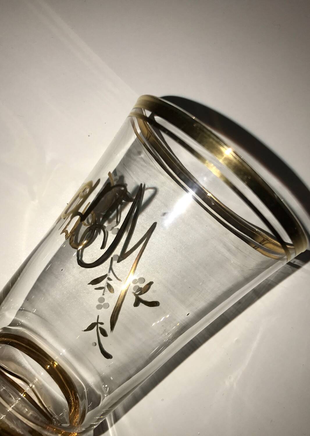 Antique gilded glass with the inscription Maman