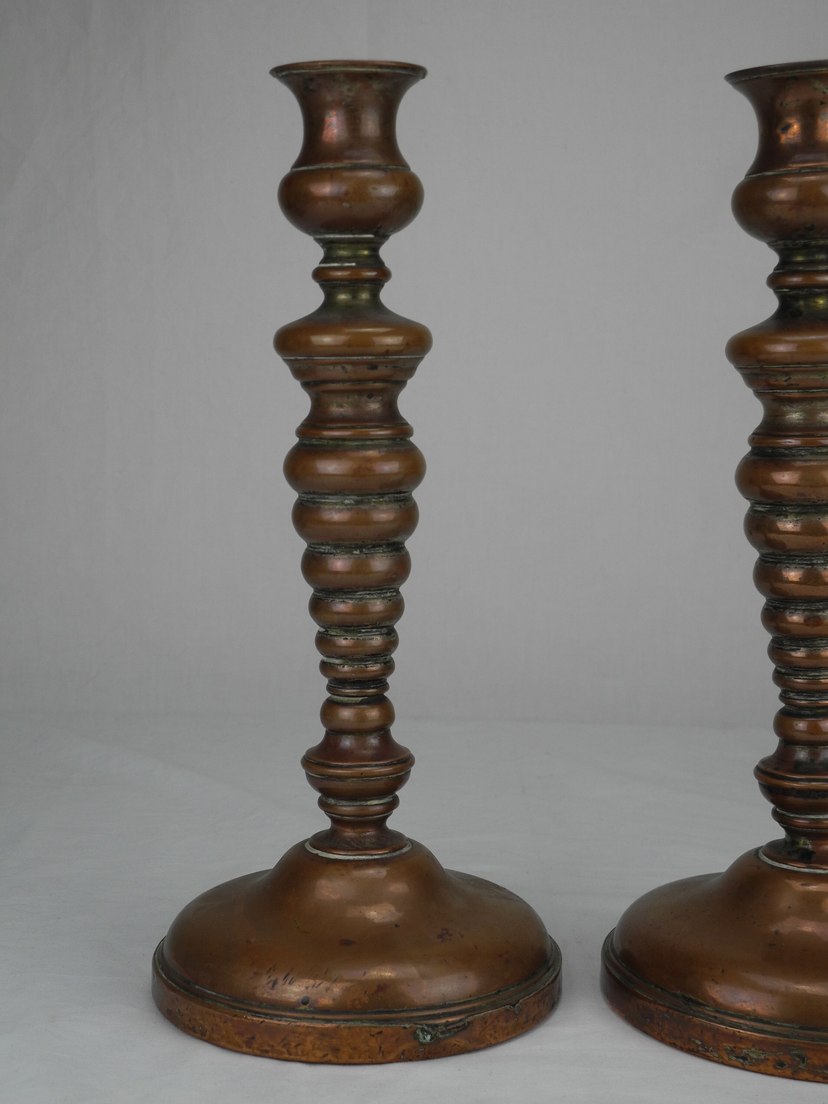 Pair of French copper candlesticks, 19th century