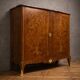 Wooden cabinet with doors, richly inlaid with floral patterns, Louis XV style.