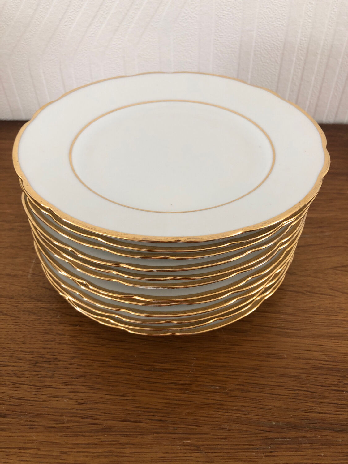 12 white porcelain dessert plates from Limoges CG Cie