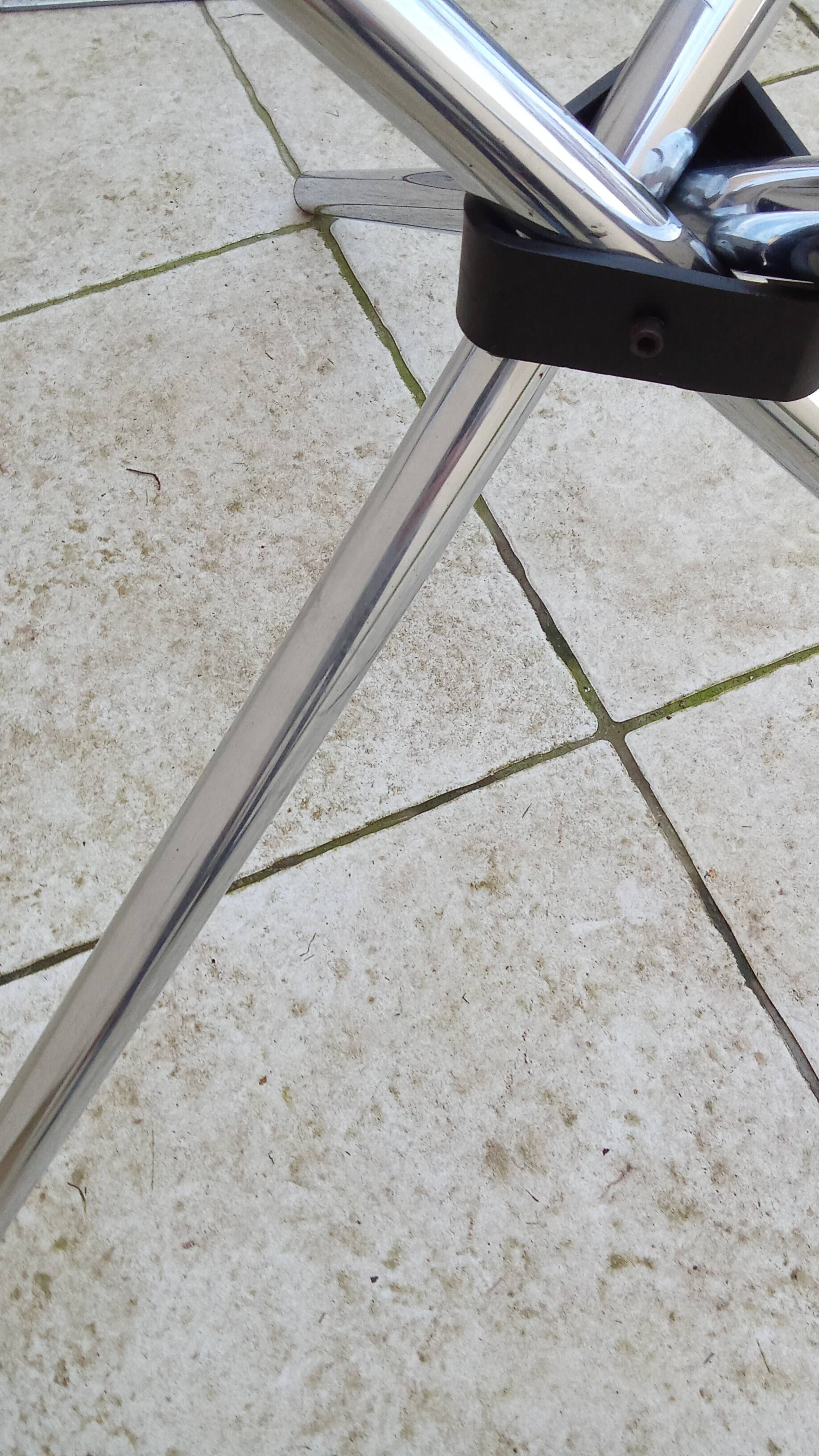 Vintage 70s table with glass and chrome legs.