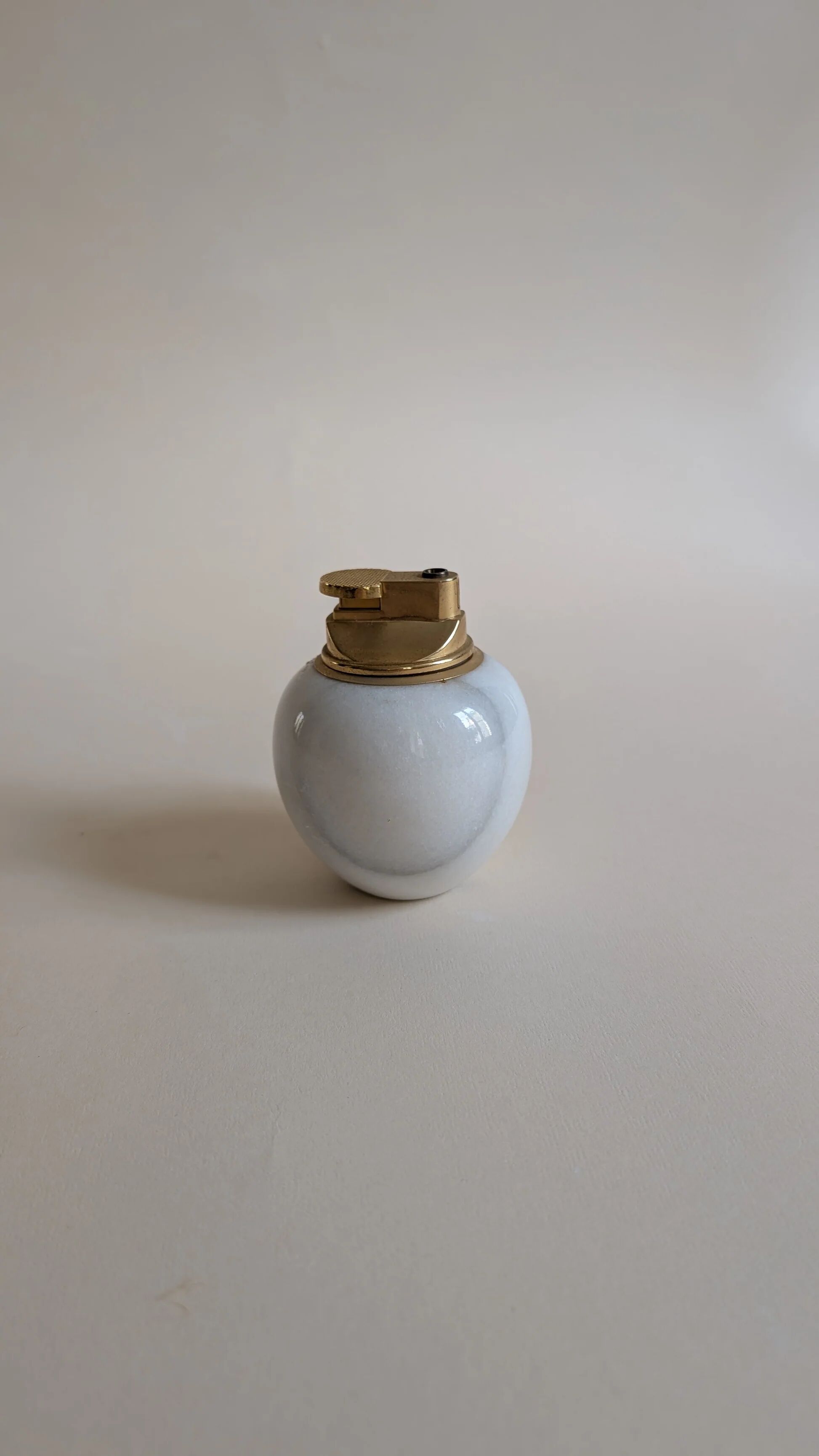 Table lighter in stone