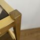 VINTAGE SHELF CONSOLE IN GOLD METAL AND SMOKED GLASS