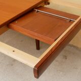 Expandable teak dining table