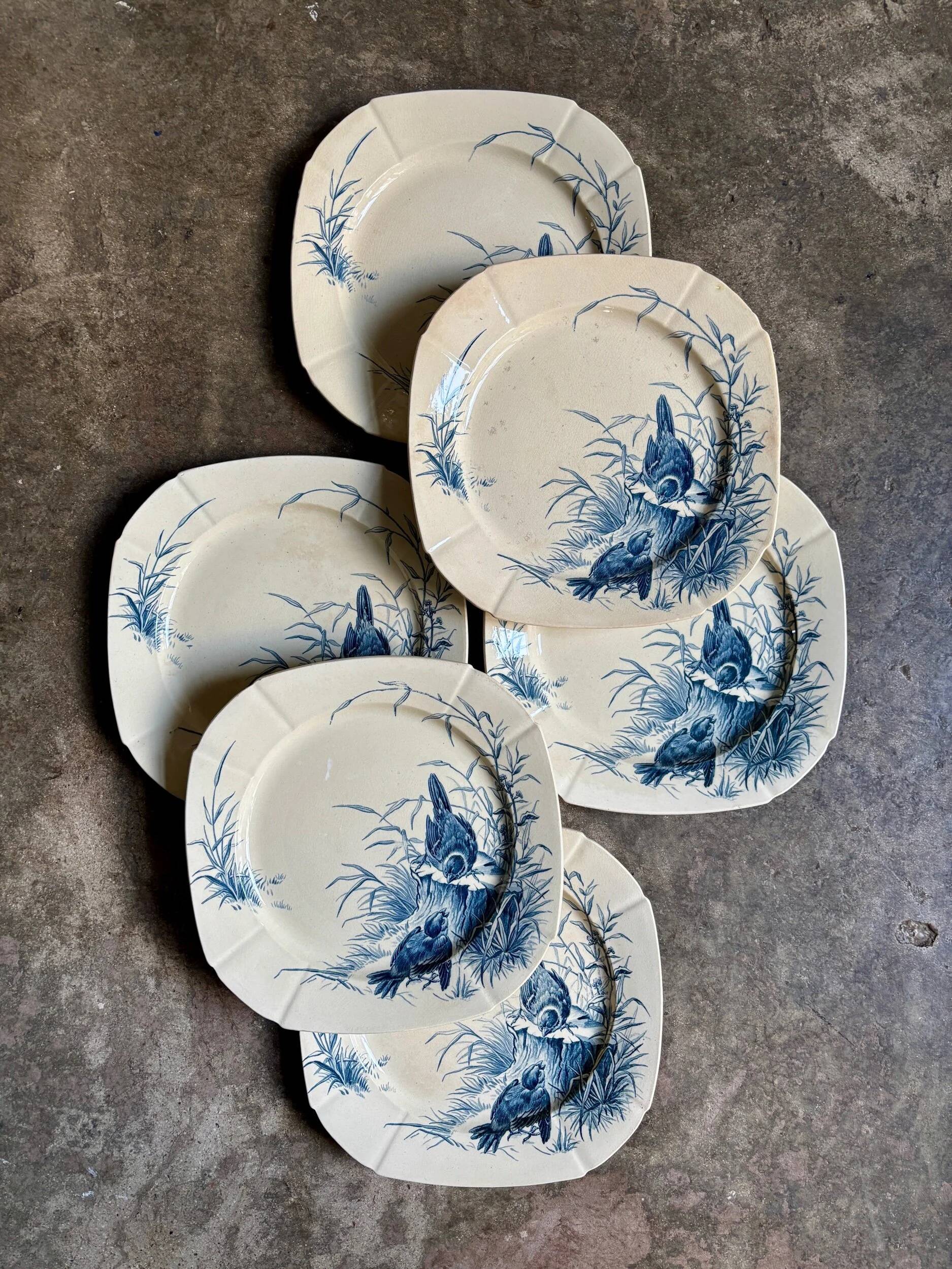 6 blue ironstone flat plates from Gien, "Birds" service, circa 1870, no. 1