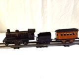 Small JEP mechanical train, including locomotive, tender, sleeping car, rail, 1930s