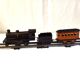 Petit train mécanique JEP, comprenant locomotive, tender, wagon lits, rail, années 1930