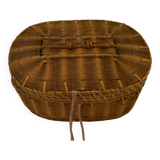 Old padded interior wicker box.
