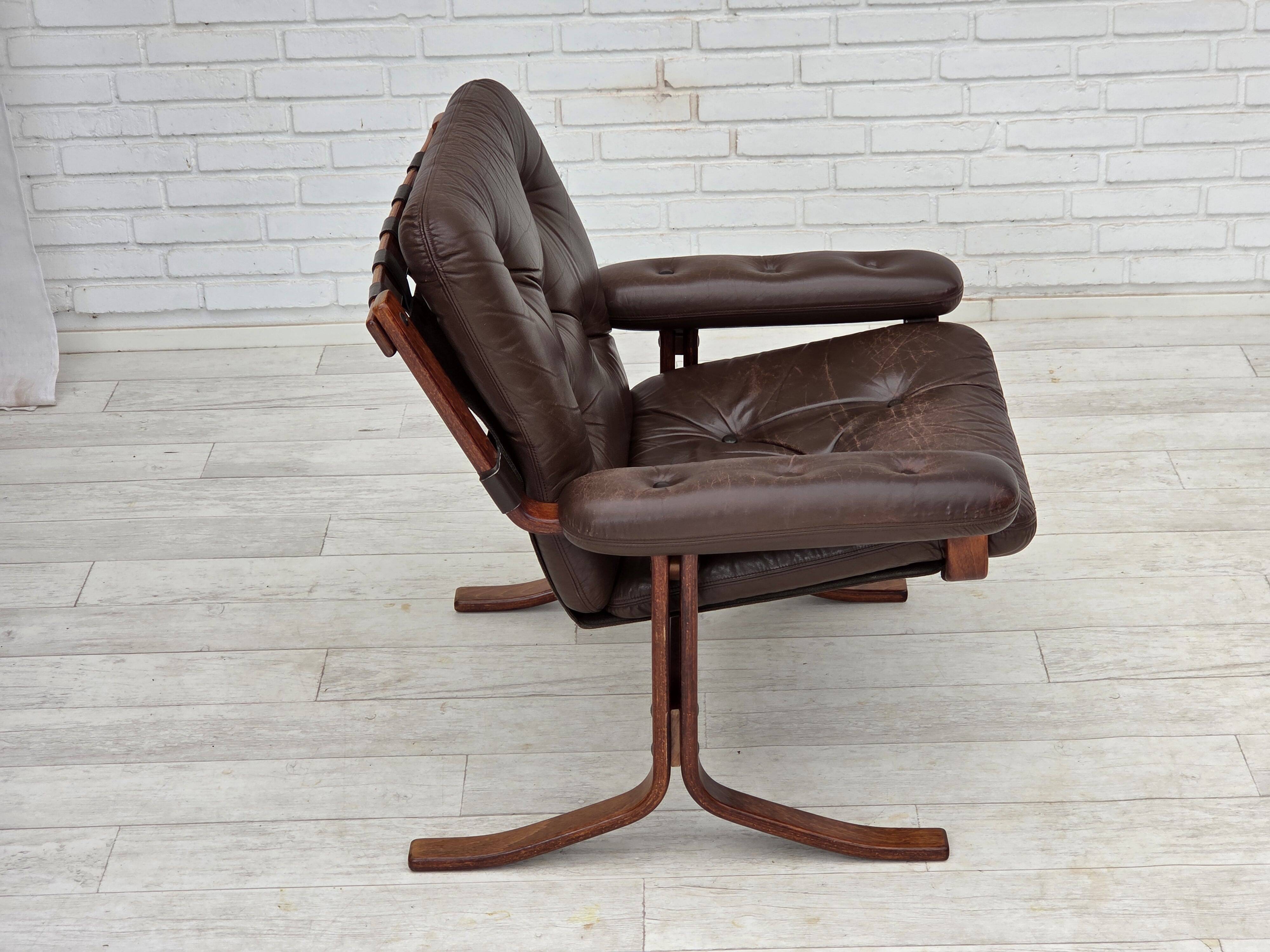 1970s, Norwegian armchair by Jon Hjortdal, furniture leather, bent wood.