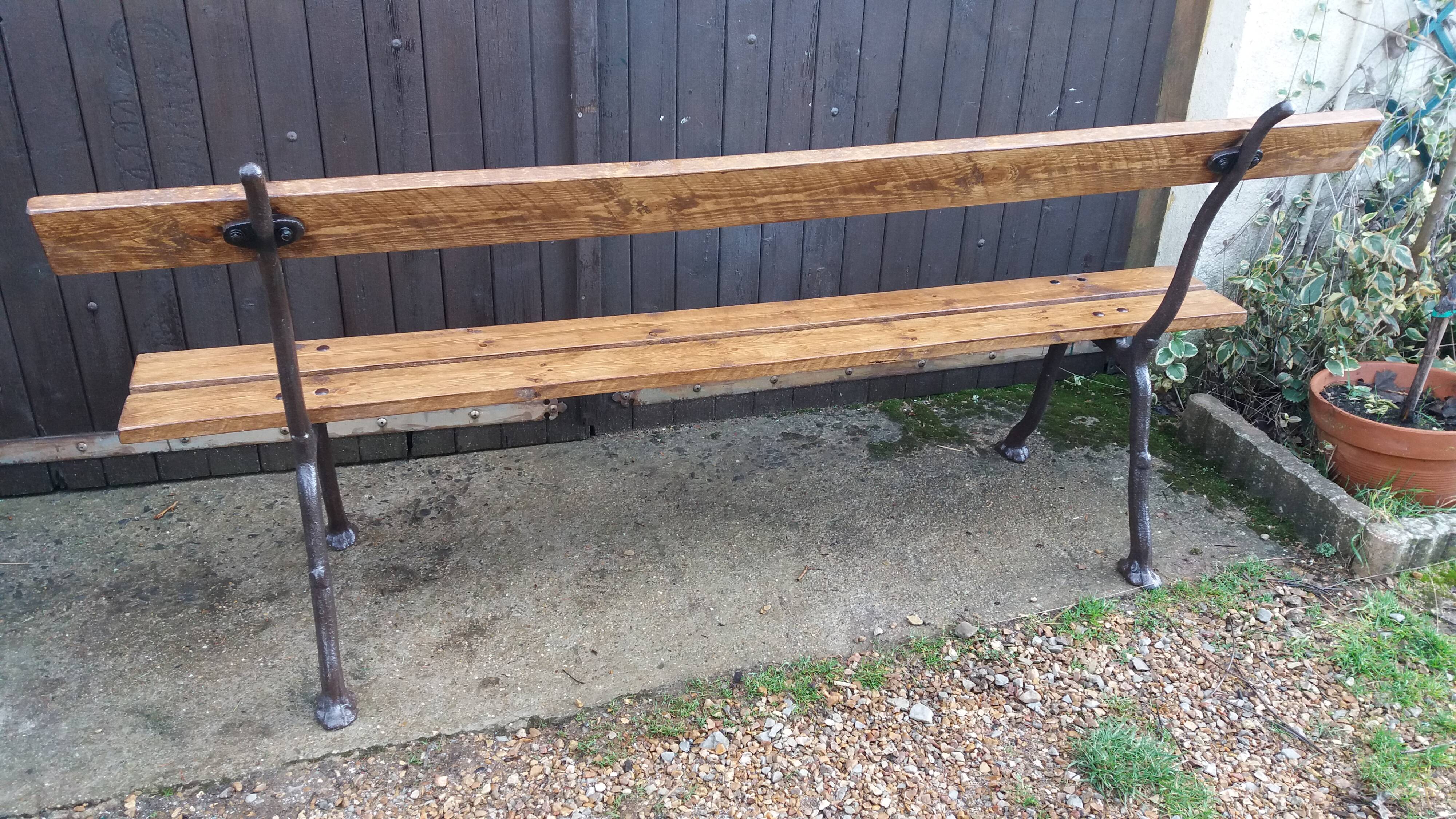 Cast iron leg garden bench