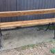 Garden bench with cast iron legs
