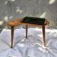 Vintage Scandinavian bean side table with wooden tapered legs.