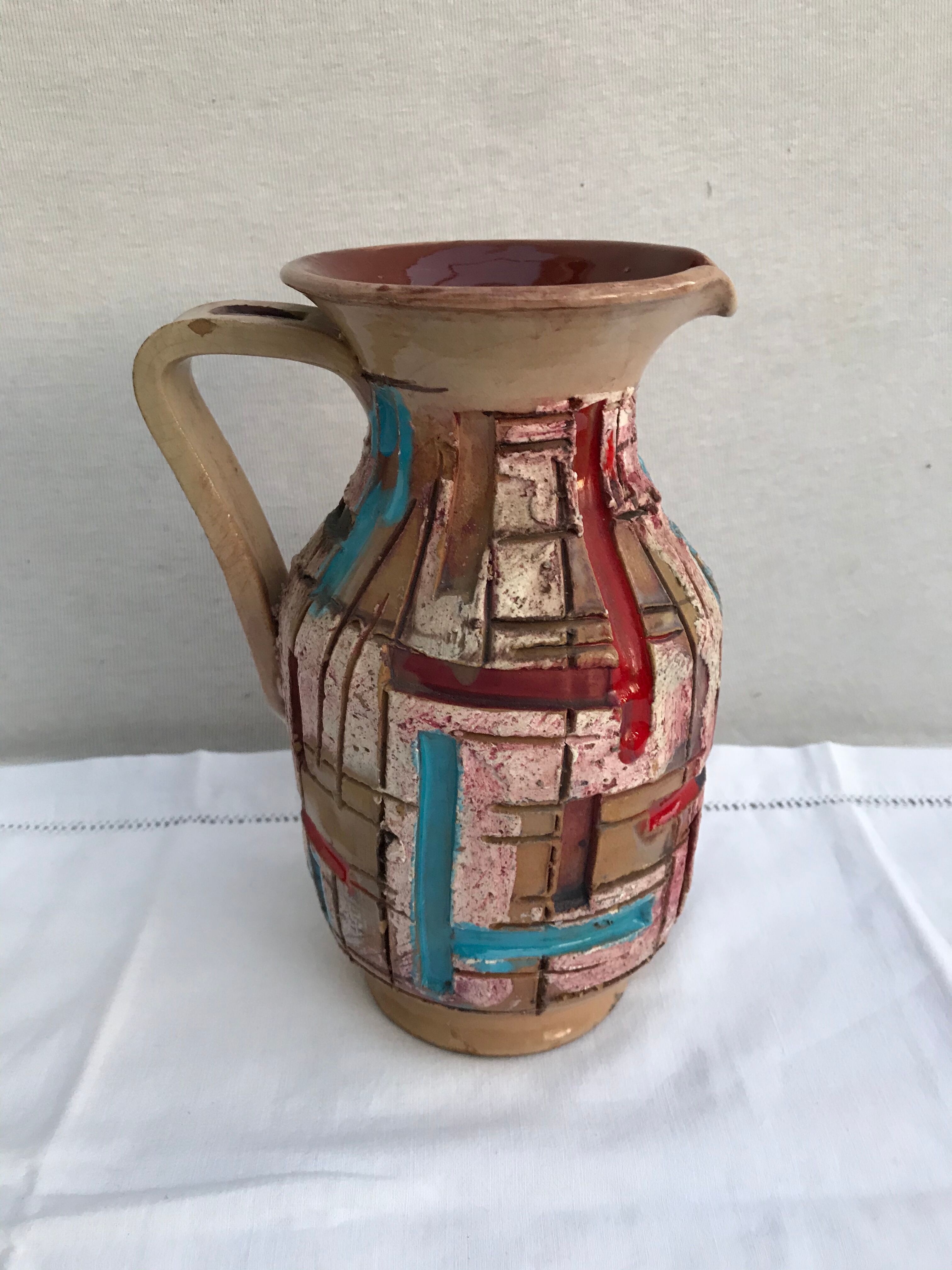 Former beige ceramic pitcher