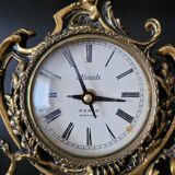 Louis XV style gilded bronze clock
