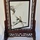 Chinese wooden table screen, decorated with feather marquetry.