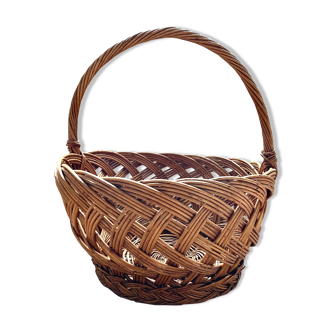 Vintage basket in braided wicker