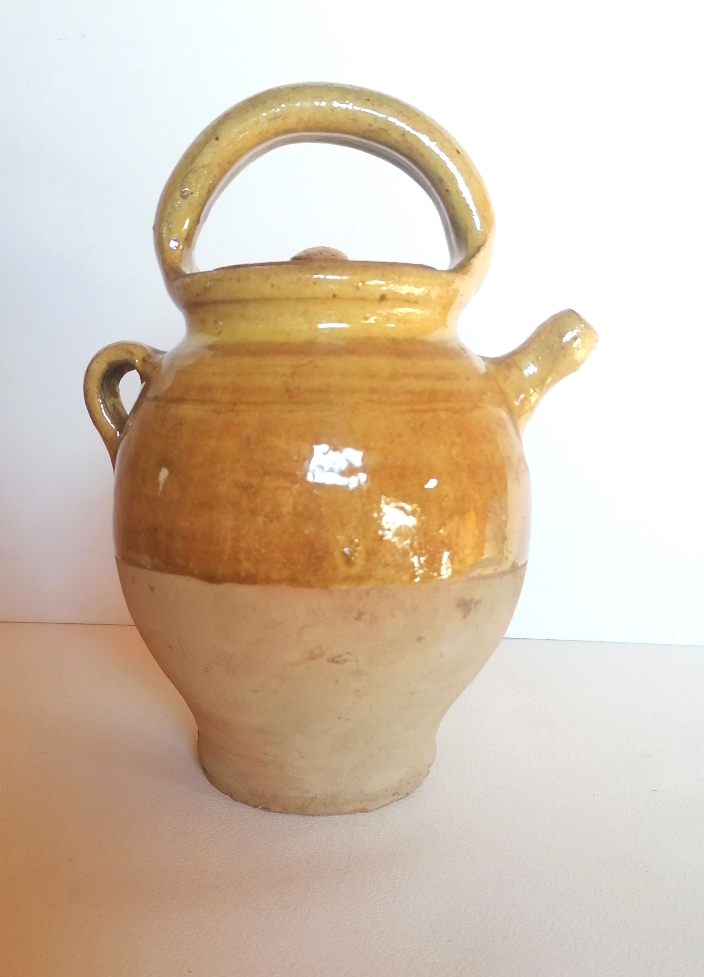 Enamelled jug with lid