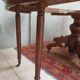 English oval table with 19th century mahogany extensions