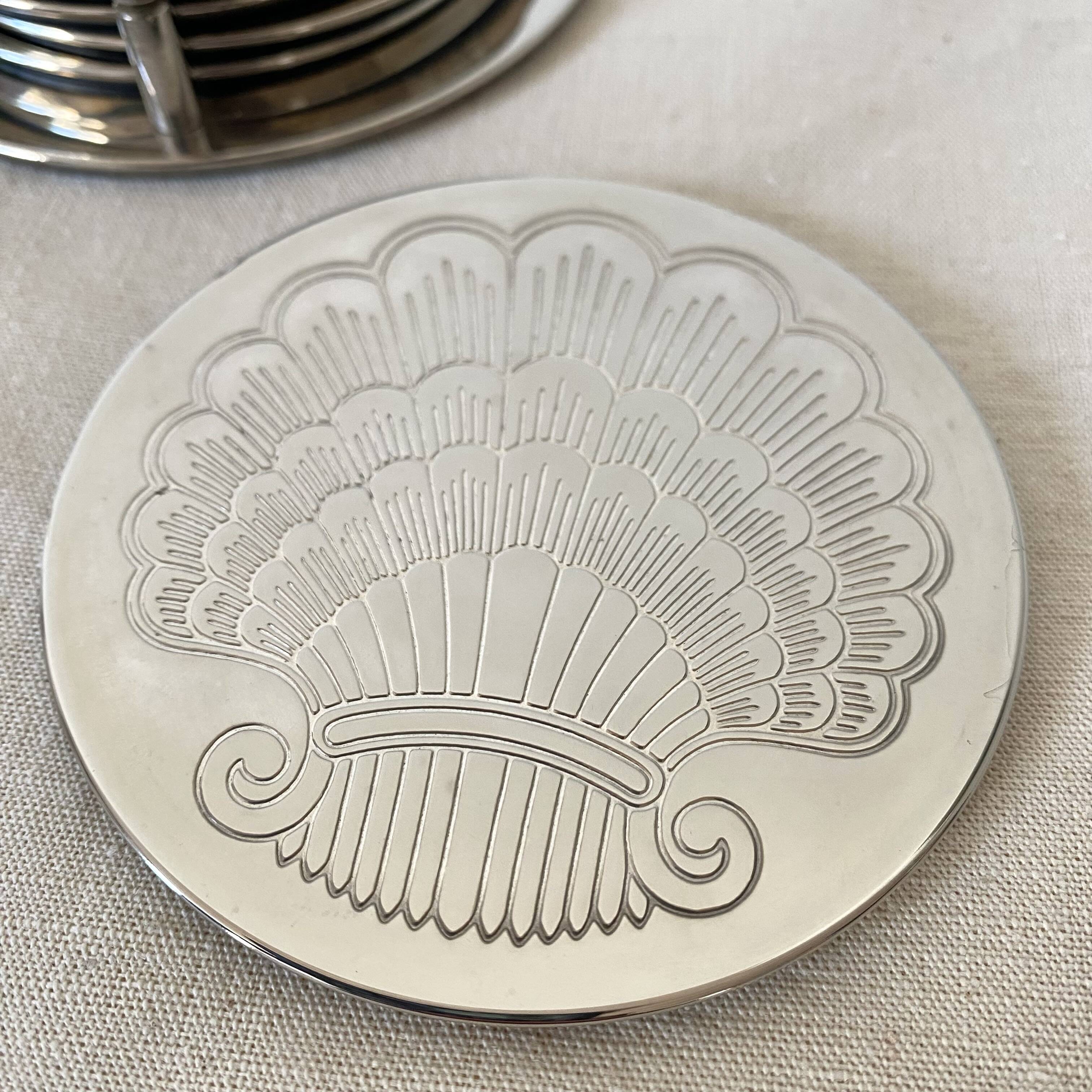 Silver coaster and holder, shell, 80s