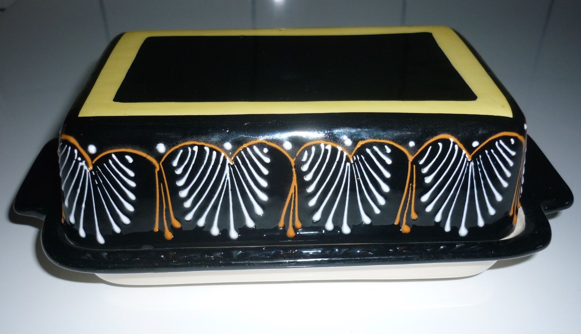 Butter dish with its black lid signed HB