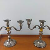 Pair of silver metal candlesticks