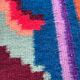 Rug with floral design on a blue background made by hand in Romania