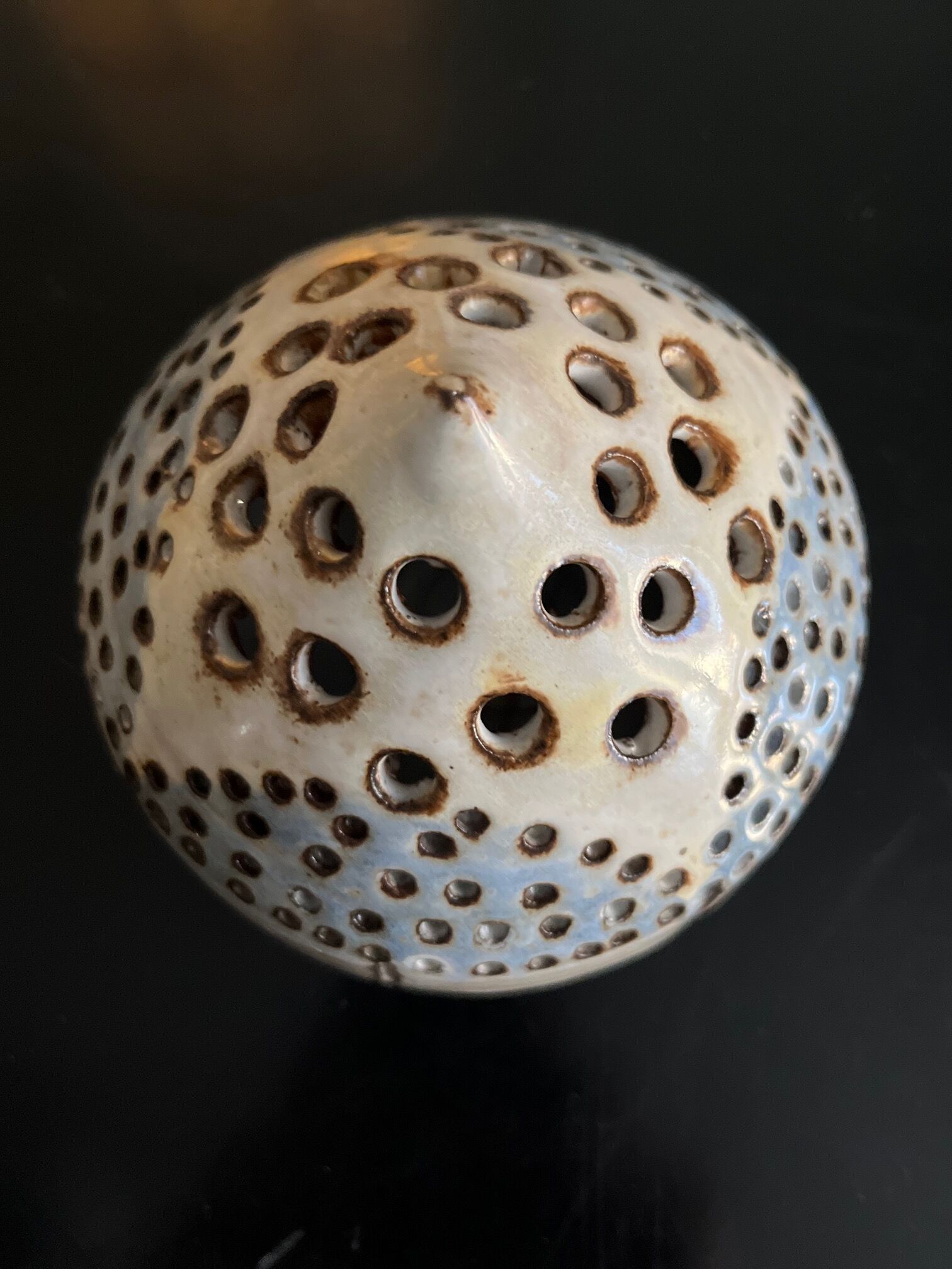 Ceramic flower pique at the old mill