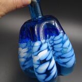 Blue glass vase and touches of white