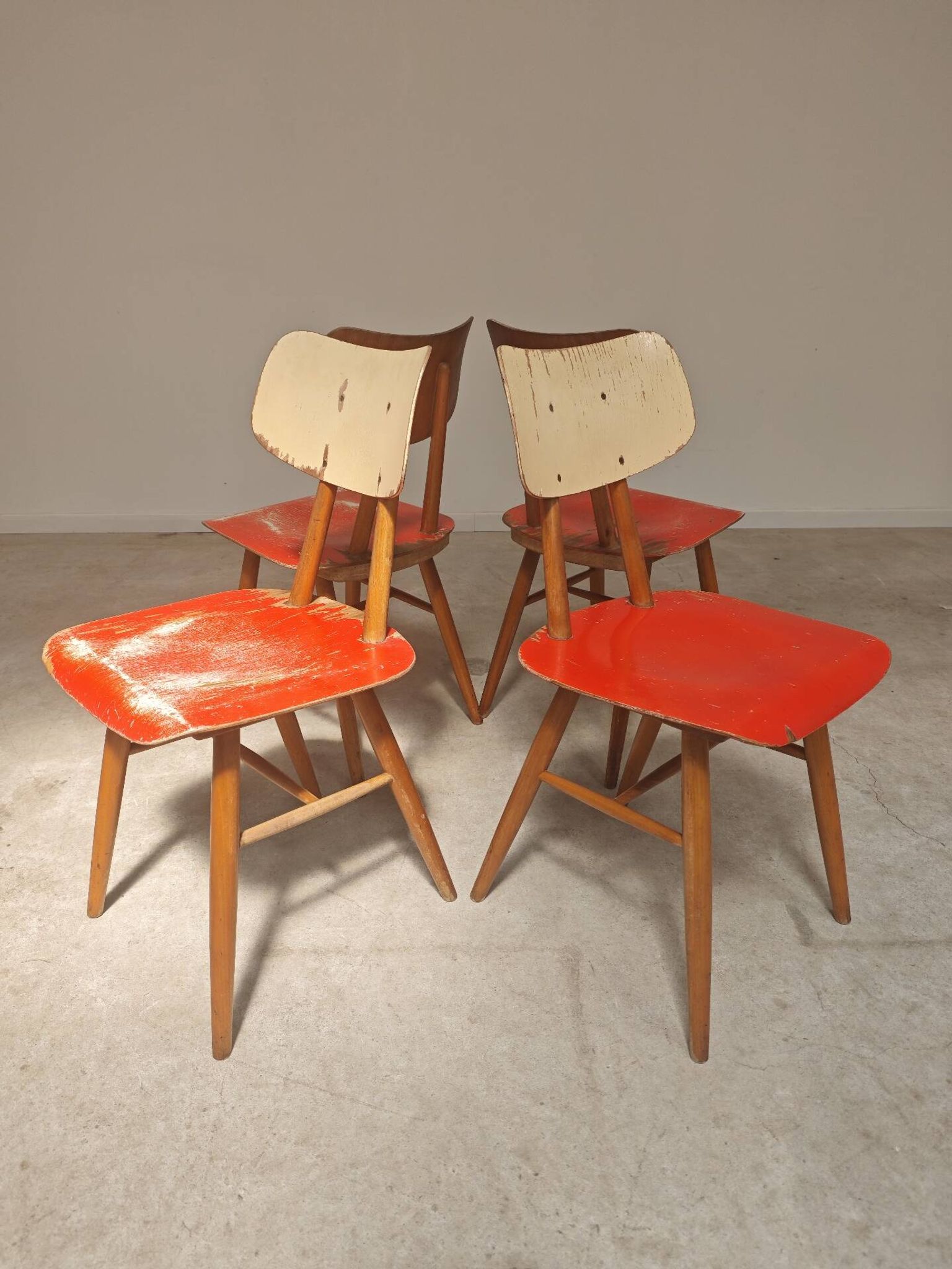 Set of 4 Ton (Thonet) red wooden chairs from the 1960s.