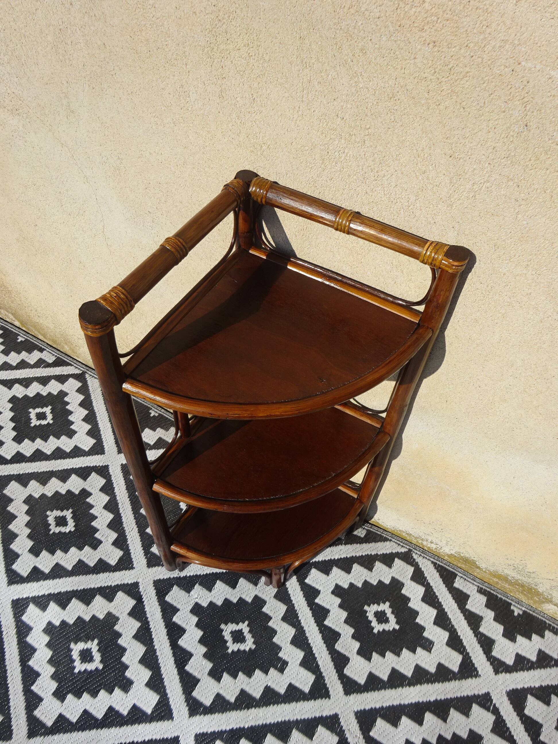 Rattan and bamboo bedside tables, both.