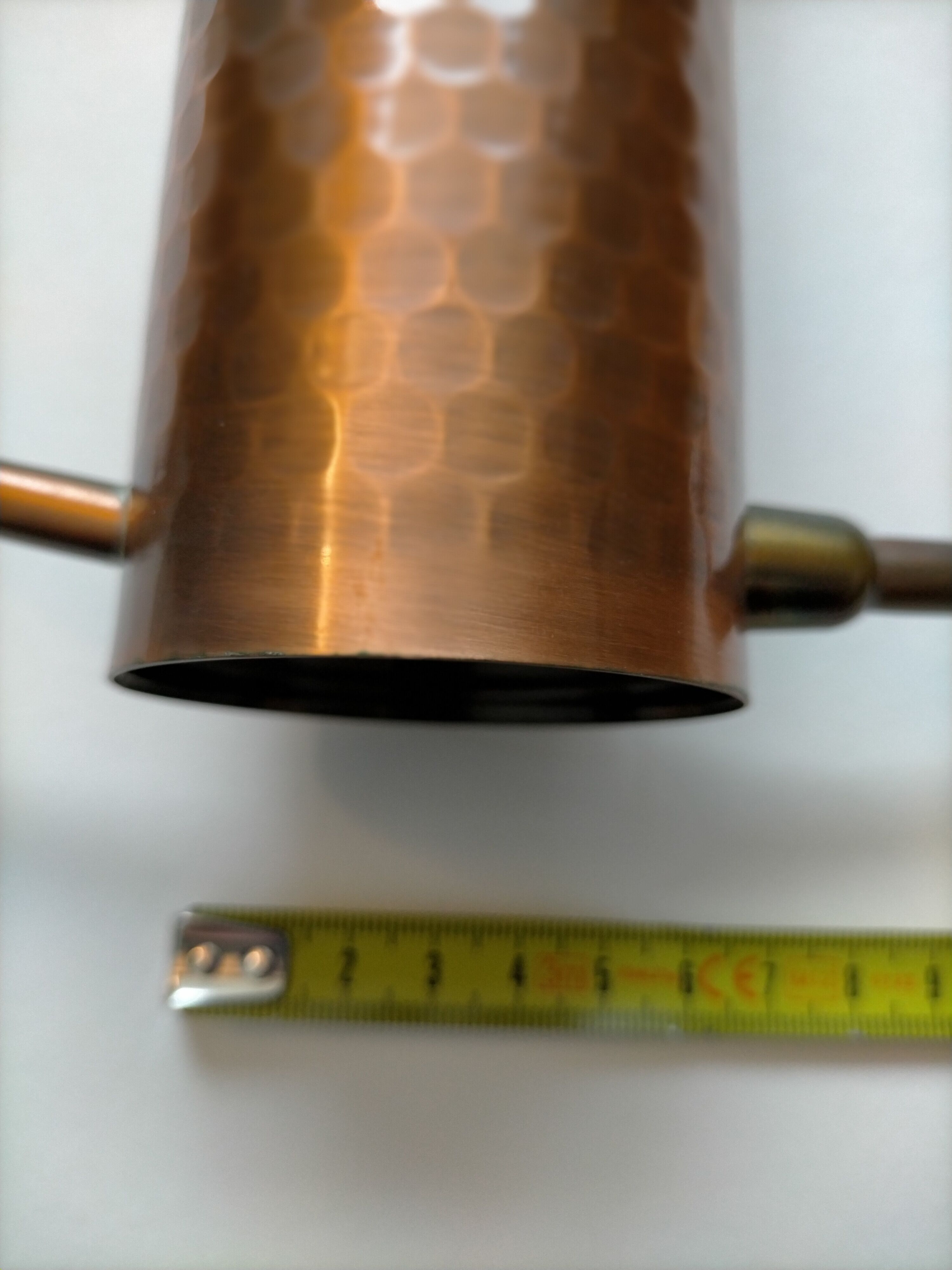 Hammered copper watering can