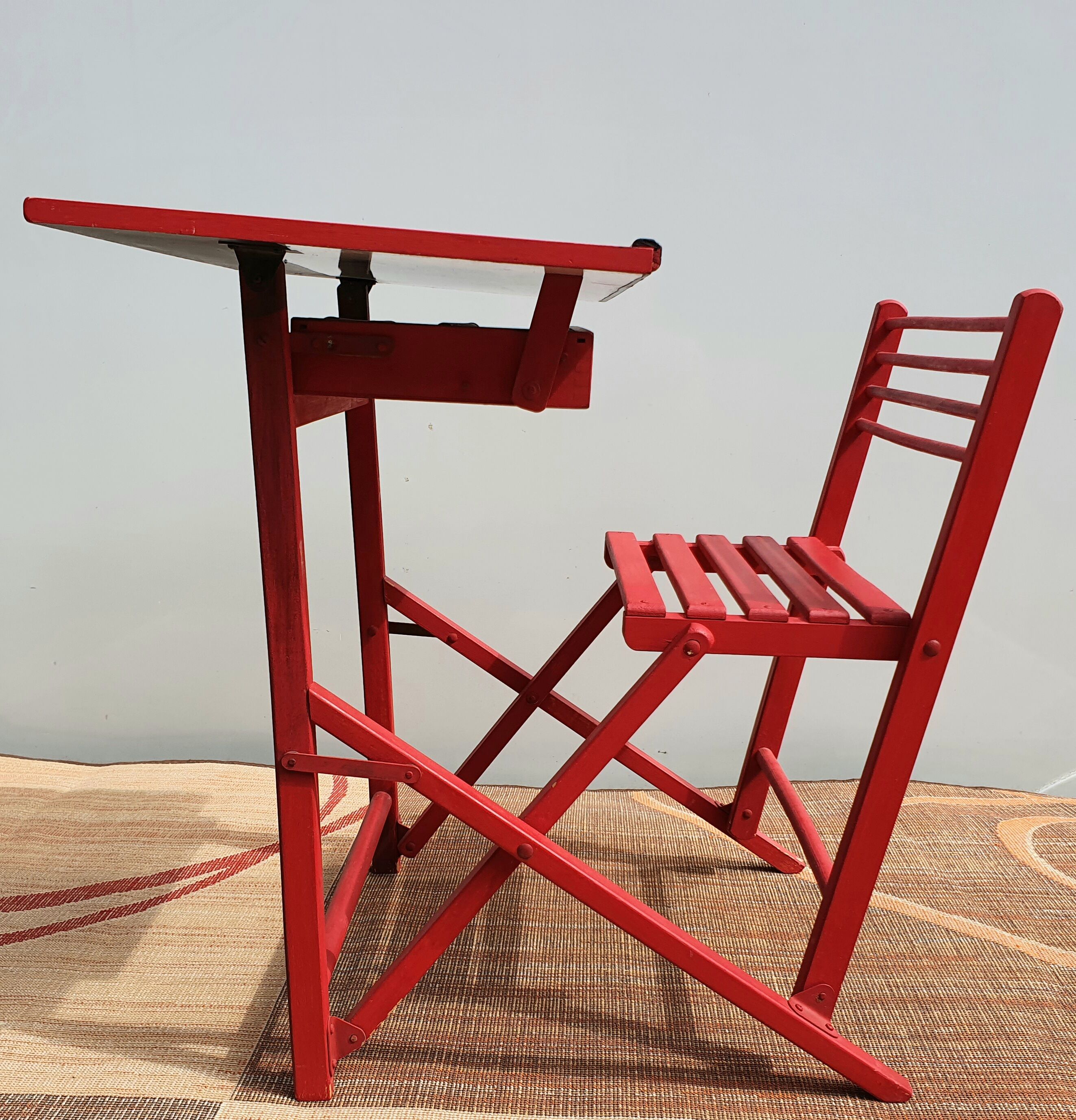 Folding children's desk made of painted wood