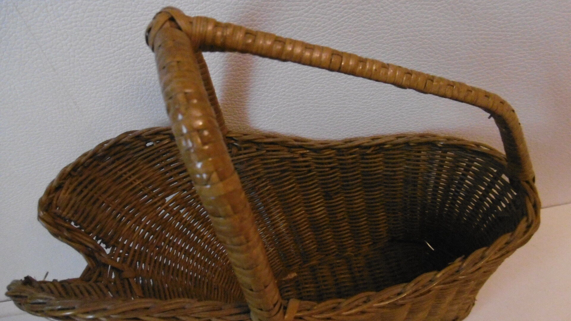 Old wicker bottle holder