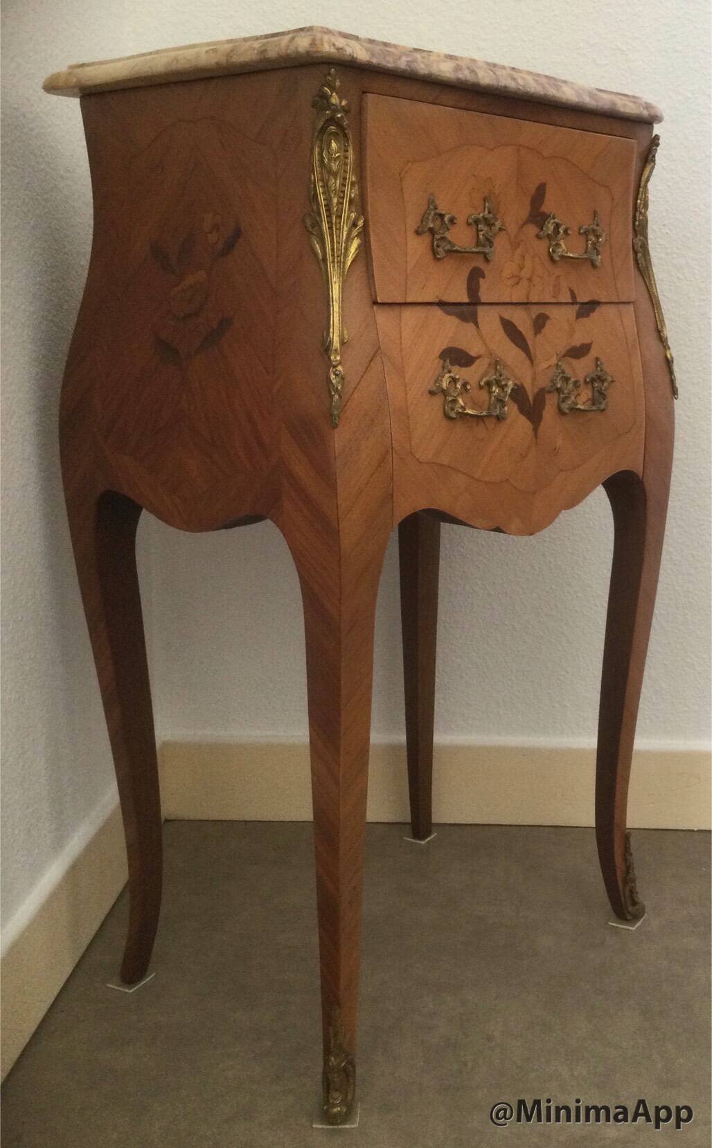 Pair of curved bedside tables in the Louis XV style with noble wood marquetry from the period.