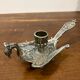 Brass peacock candle holder