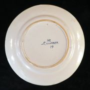 Assiette en faience Hr Quimper décor floral peint a la main